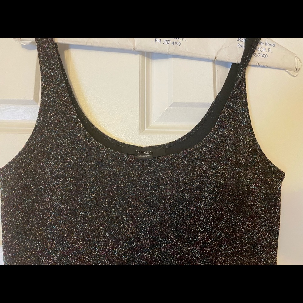 Calf length black dress with rainbow metallic.
